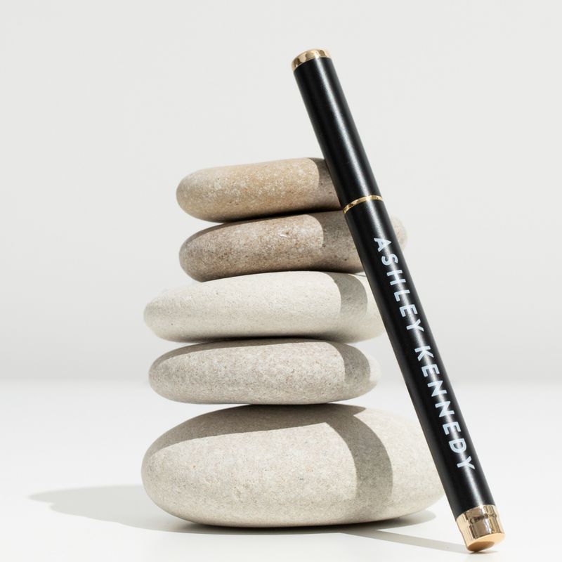 Caviar (black) adhesive pen for lashes by Ashley Kennedy.